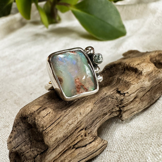 Boulder Opal green sapphire ring close up, teal green shifting color play Natural Earth Collective Ohio