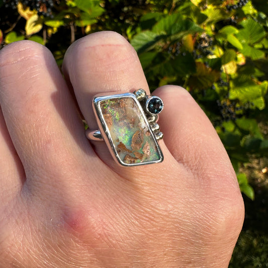 Deep blue Boulder Opal London Blue Topaz ring close up, sea green teal color Natural Earth Collective Ohio