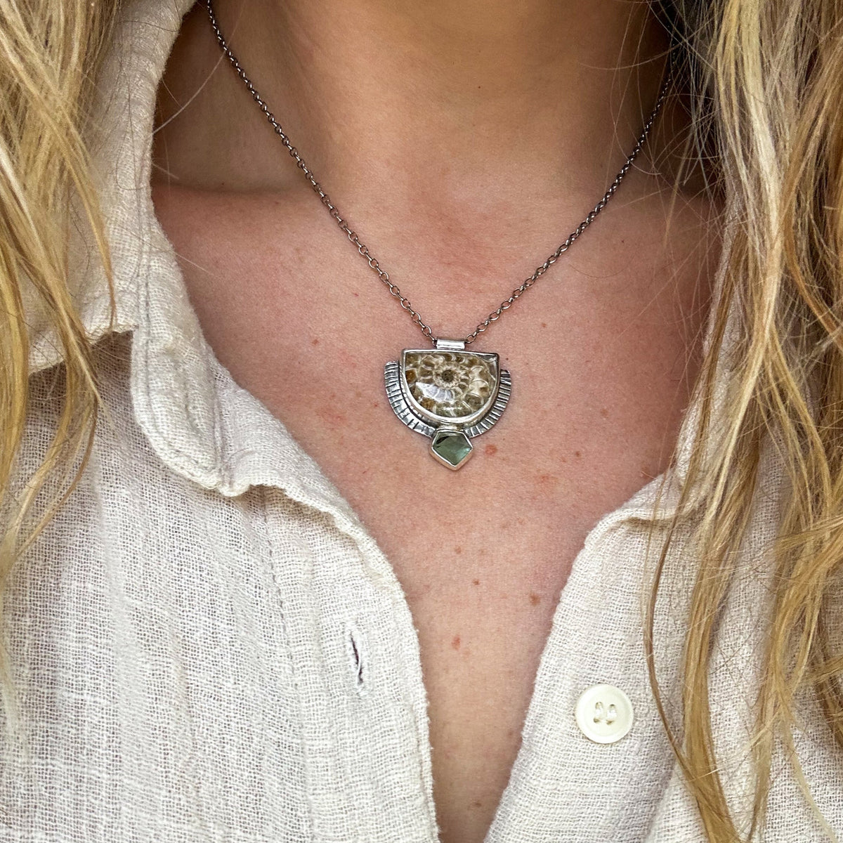 Ammonite aquamarine pendant necklace close up, iridescent fossil sterling silver Natural Earth Collective Ohio