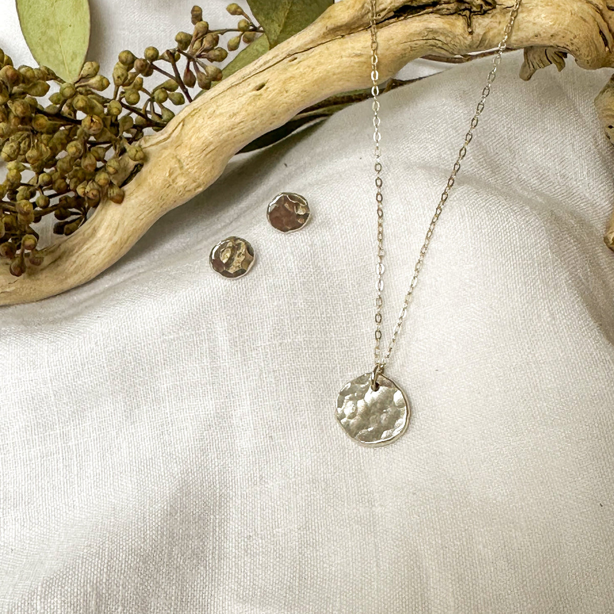Hammered dot stud earrings close up, recycled sterling silver Natural Earth Collective Ohio