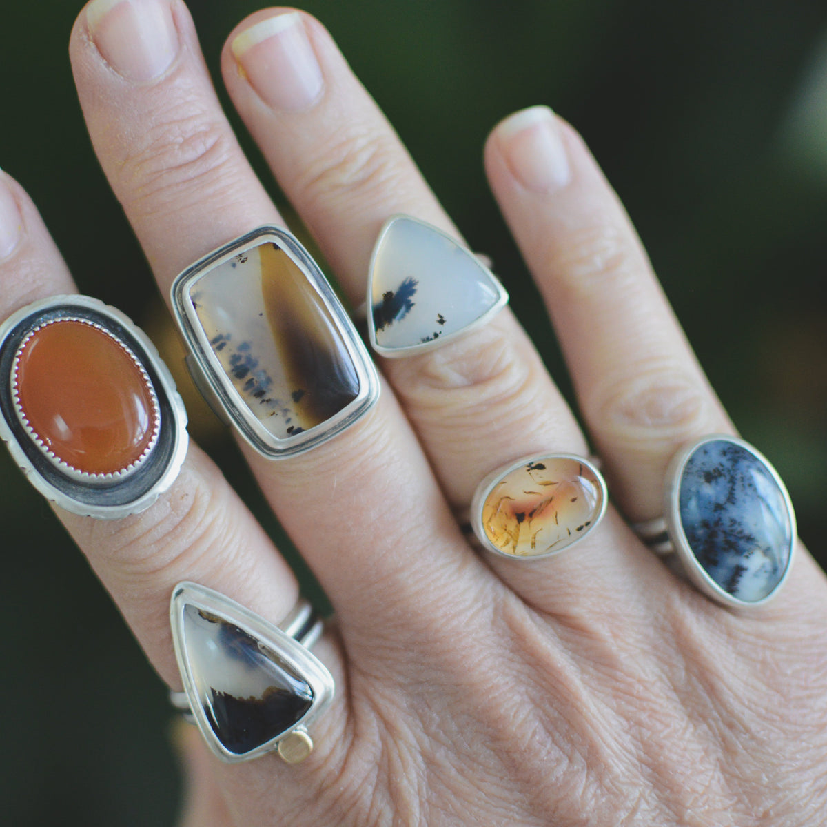 Trillion Dendritic Agate ring on hand, one of a kind artisan Natural Earth Collective Ohio