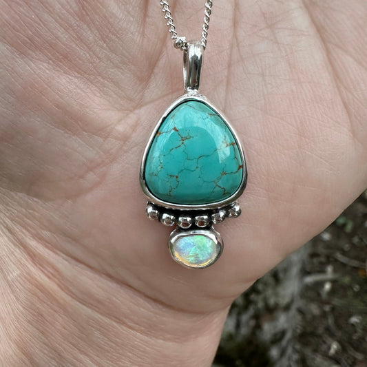 Royston Turquoise opal teardrop pendant close up, rainbow flash opal Natural Earth Collective Ohio