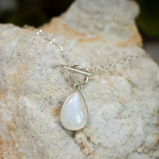 Moonstone dainty toggle necklace close up, strong blue adularescence Natural Earth Collective Ohio