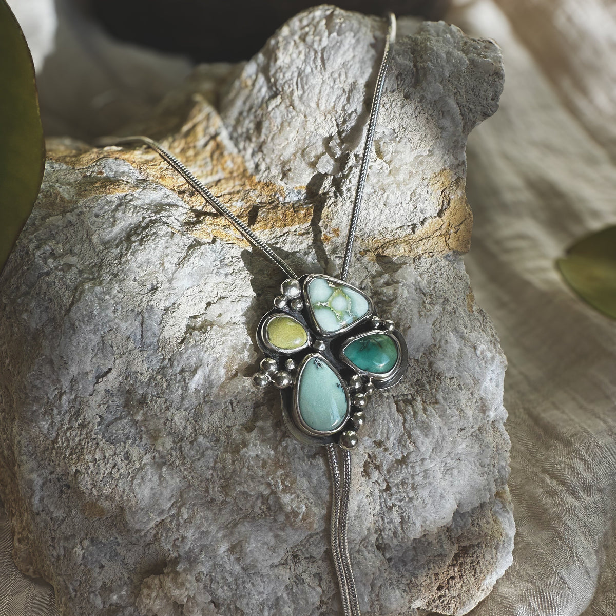 Turquoise bloom bolo on neck, adjustable multi-stone Natural Earth Collective Ohio