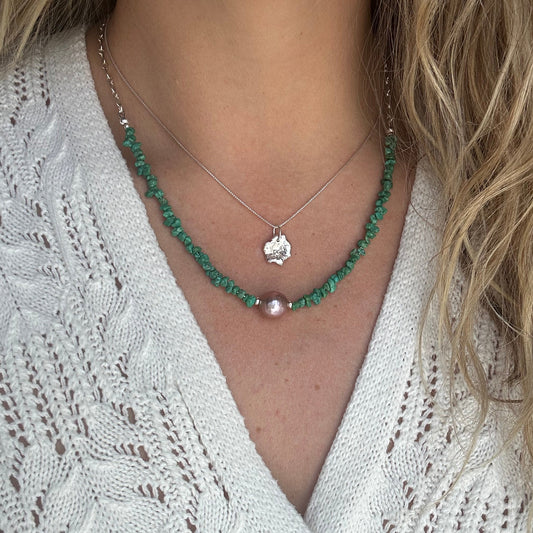 Organic token necklace close up, one of a kind recycled sterling silver shape Natural Earth Collective Ohio