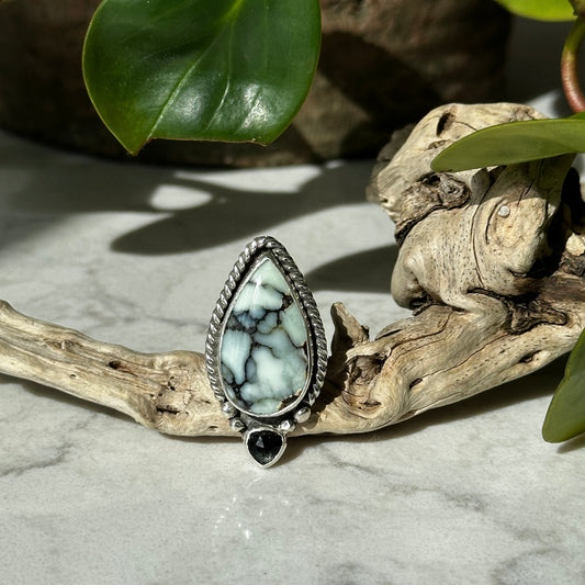 Aloe Variscite moss aquamarine ring on hand, watery blue-green Nevada variscite Natural Earth Collective Ohio