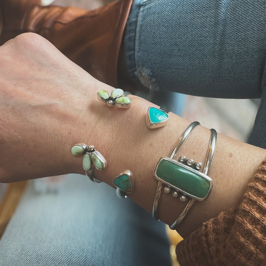 Twin Mesa cuff bracelet close up, triangular turquoise stones at each end Natural Earth Collective Ohio