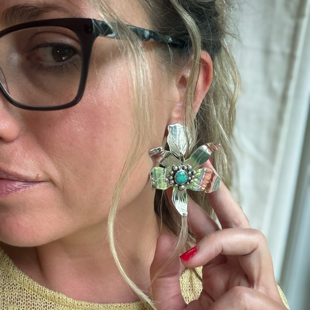 Close up sterling silver handcrafted flower statement earrings set with # * mine turquoise - natural Earth collective jewelry Ohio