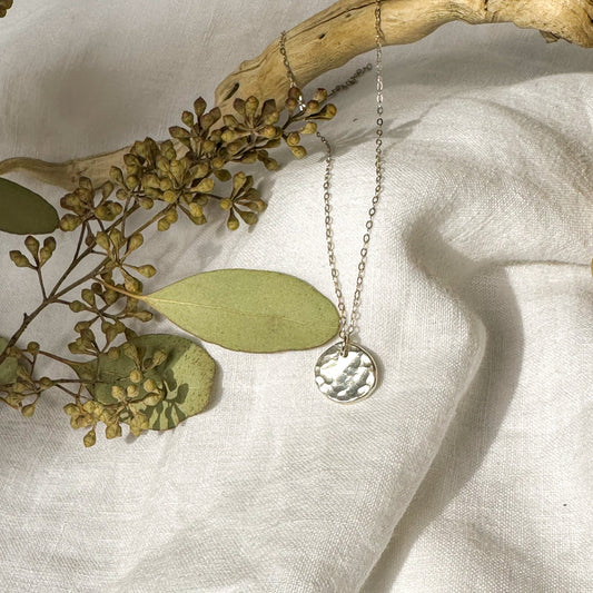 Hammered dot necklace close up, recycled sterling silver sustainable Natural Earth Collective Ohio