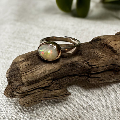 Ethiopian Opal ring No.3 on hand, artisan jewelry Natural Earth Collective Ohio