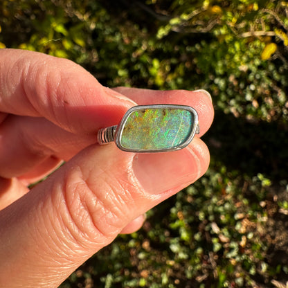 Green Boulder Opal ring on hand, one of a kind handcrafted Natural Earth Collective Ohio