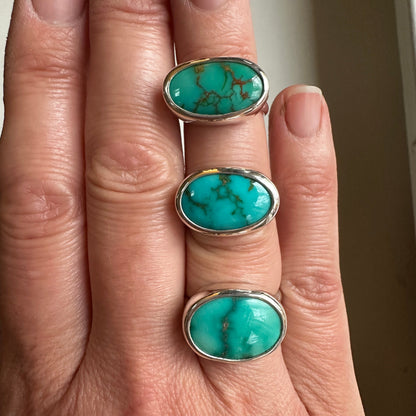 Gemmy turquoise ring on hand, one of a kind handcrafted Natural Earth Collective Ohio