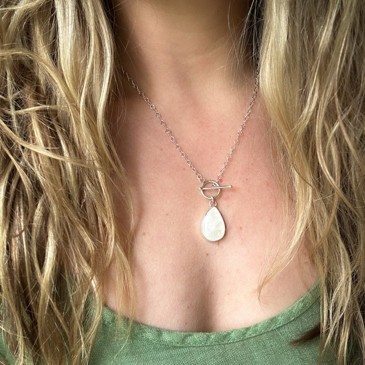 Moonstone toggle necklace detail, fine silver setting oval cable chain Natural Earth Collective Ohio