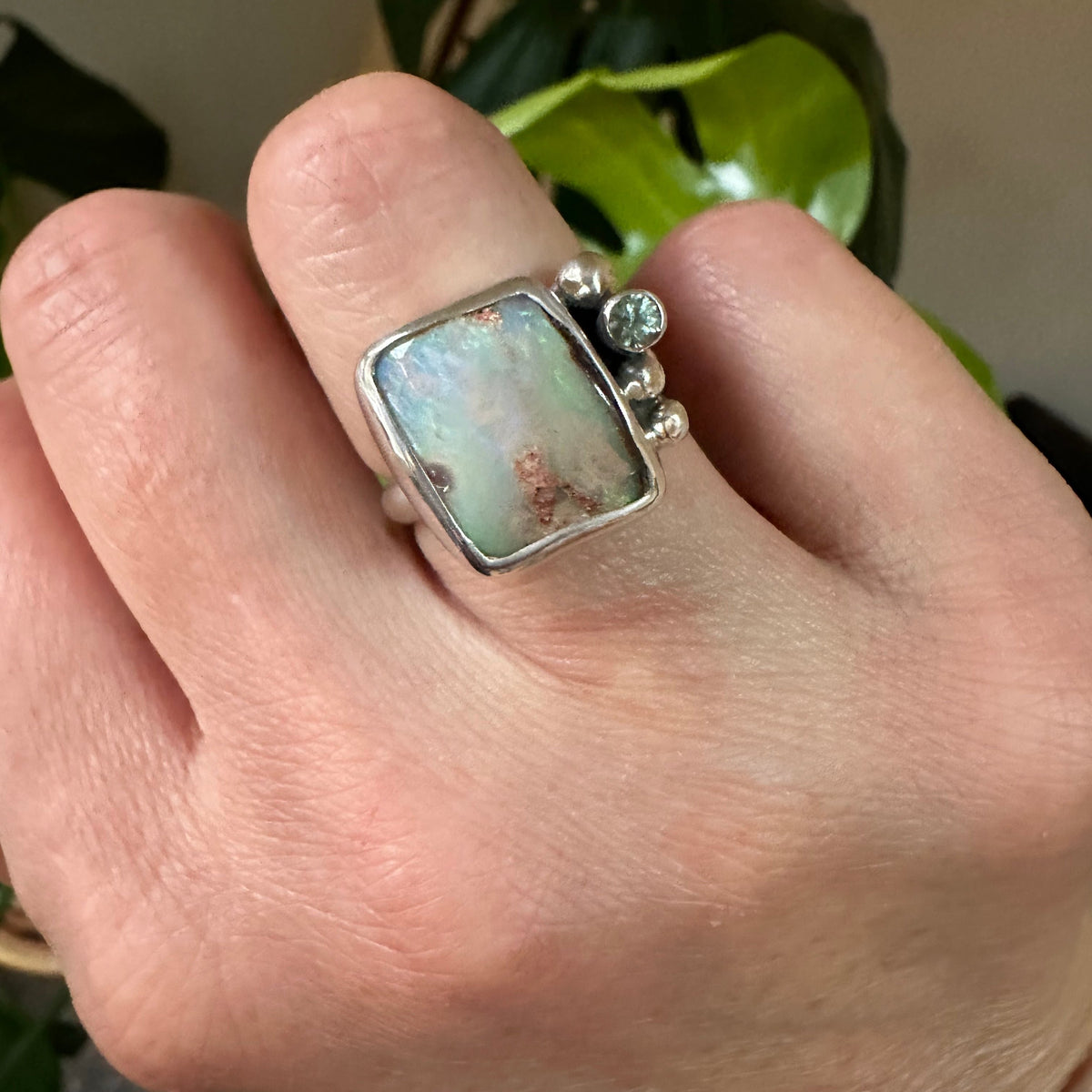 Boulder Opal and sapphire ring detail, deep green natural stone Natural Earth Collective Ohio
