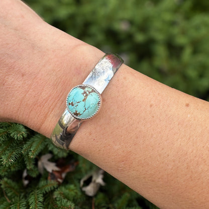 Turquoise cuff bracelet on wrist, one of a kind handcrafted Natural Earth Collective Ohio