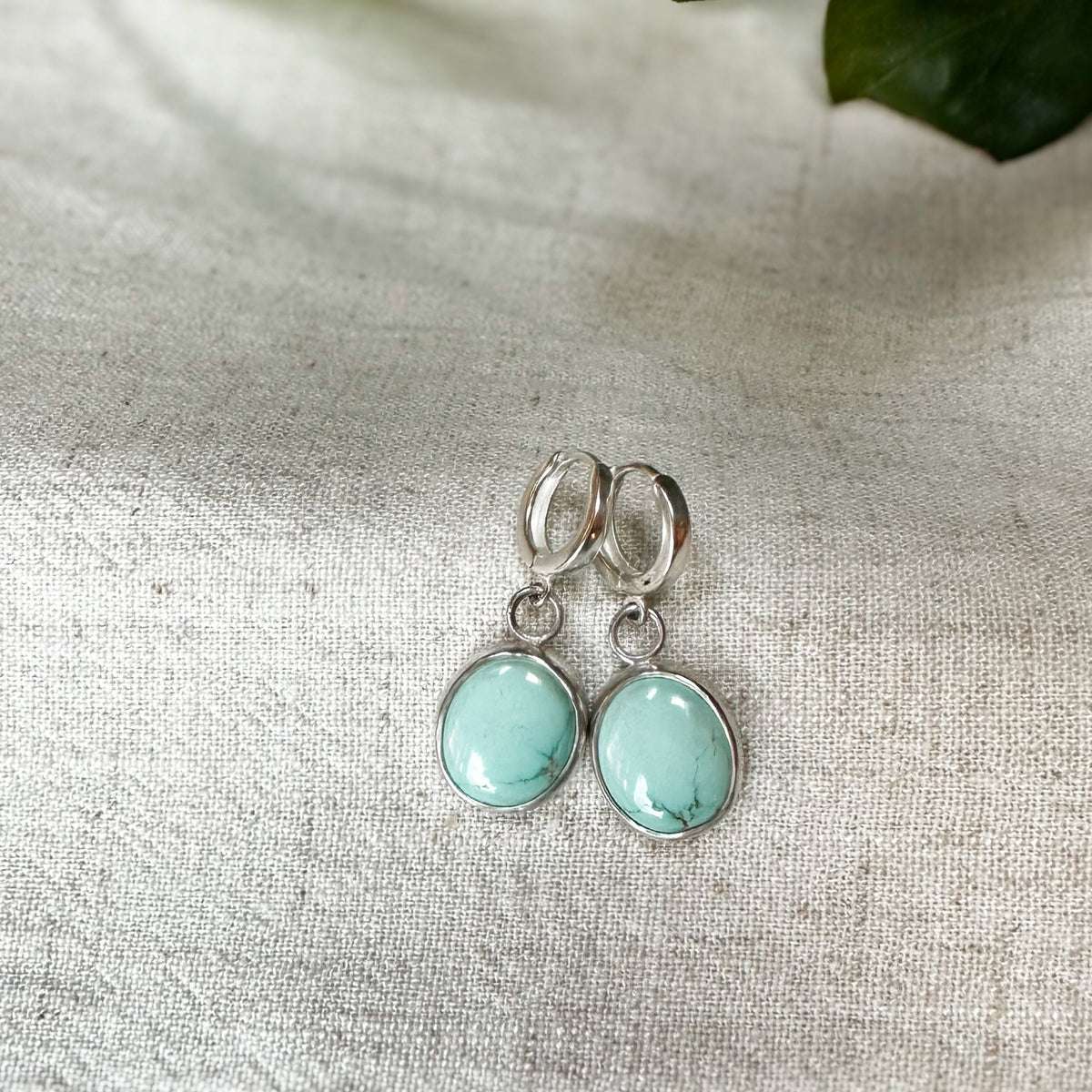 Lone Mountain Turquoise hinge hoop earrings close up, pale blue Nevada turquoise Natural Earth Collective Ohio