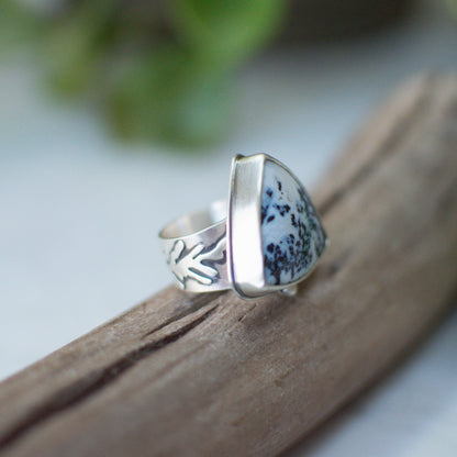 Dendritic Agate ring close up, creamy white with black branch-like inclusions Natural Earth Collective Ohio