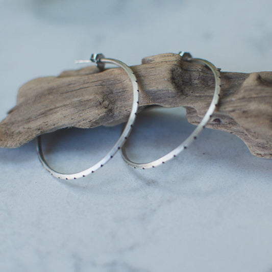 Hammered triangle hoops close up, oxidized matte texture sterling silver Natural Earth Collective Ohio