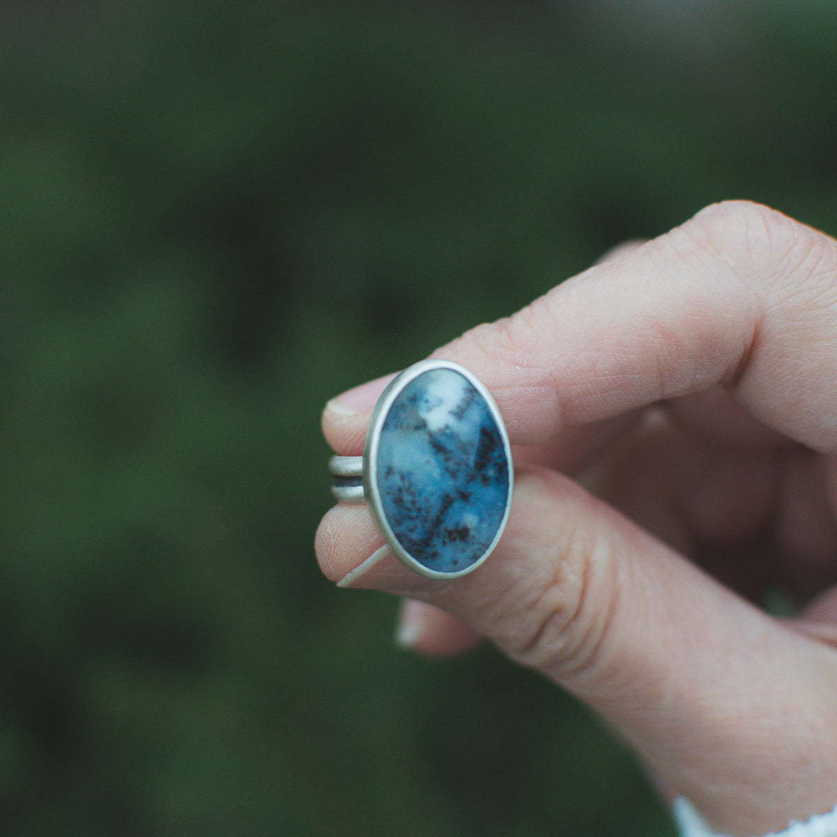 Dendritic Agate ring on hand, one of a kind handcrafted Natural Earth Collective Ohio