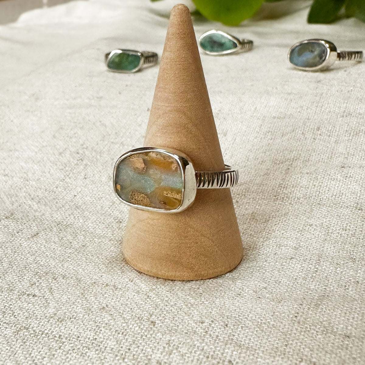 Pastel Boulder Opal ring on hand, one of a kind handcrafted Natural Earth Collective Ohio