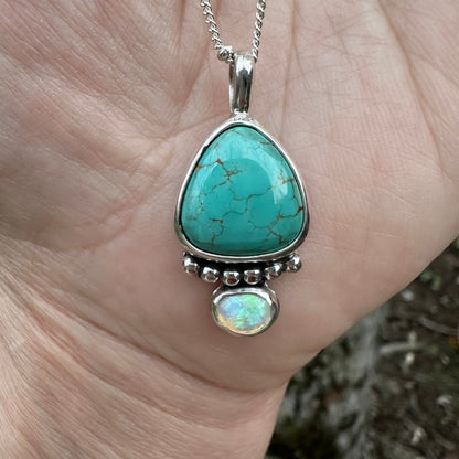 Royston Turquoise opal teardrop pendant close up, rainbow flash opal Natural Earth Collective Ohio