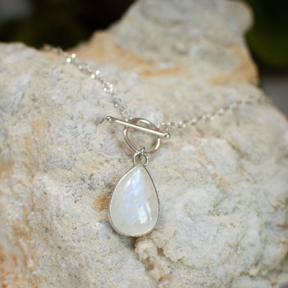 Moonstone dainty toggle necklace close up, strong blue adularescence Natural Earth Collective Ohio