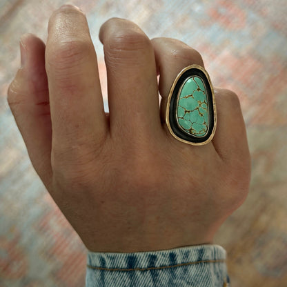Natural Iron Maiden Turquoise ring on hand, one of a kind handcrafted jewelry Natural Earth Collective Ohio