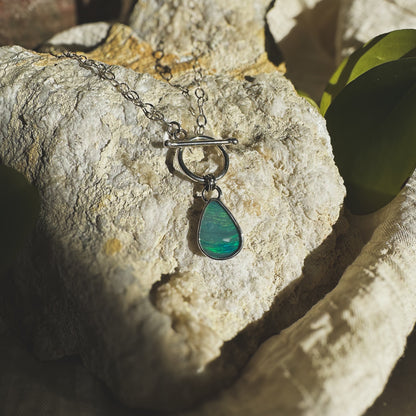 Opal teardrop toggle necklace close up, green blue color movement Natural Earth Collective Ohio