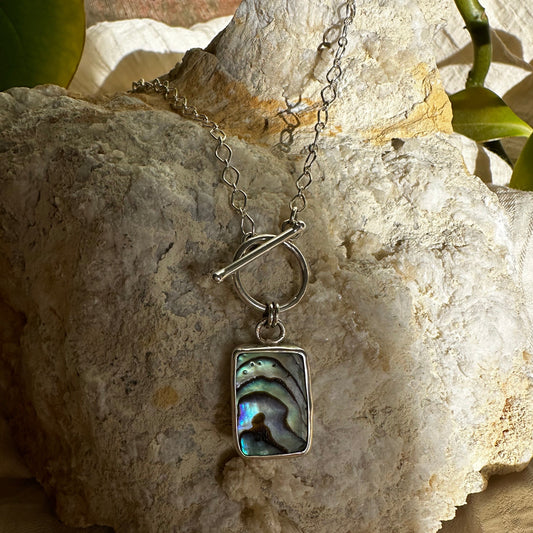 Abalone pendant necklace close up, green blue purple iridescent shell Natural Earth Collective Ohio