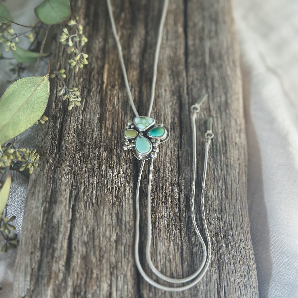 Mixed turquoise bolo necklace close up, multiple mine varieties Natural Earth Collective Ohio