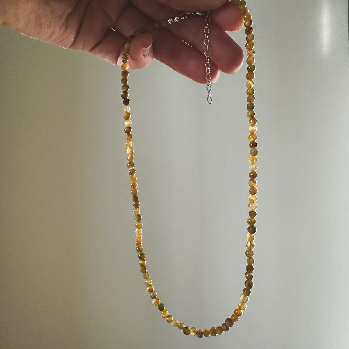 Tiger's Eye bead necklace close up, warm golden silky sheen Natural Earth Collective Ohio