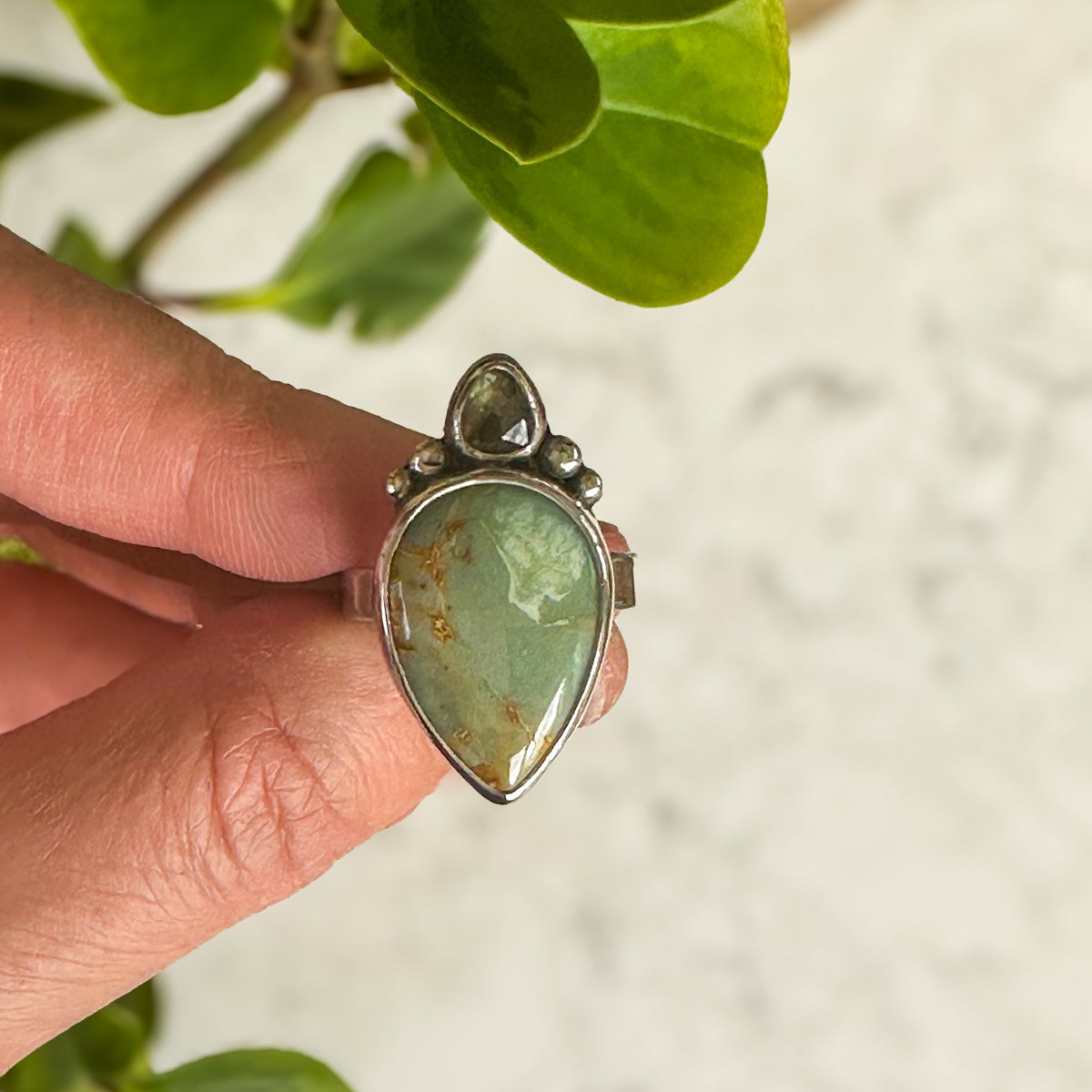 Silver Peak Variscite Madagascar Sapphire ring close up, deep green gold Nevada variscite Natural Earth Collective Ohio