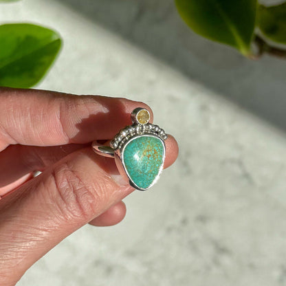 Turquoise and rutile quartz ring on hand, handcrafted sterling silver Natural Earth Collective Ohio