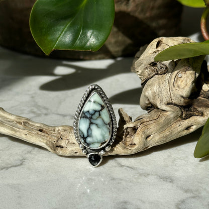 Aloe Variscite moss aquamarine ring on hand, watery blue-green Nevada variscite Natural Earth Collective Ohio